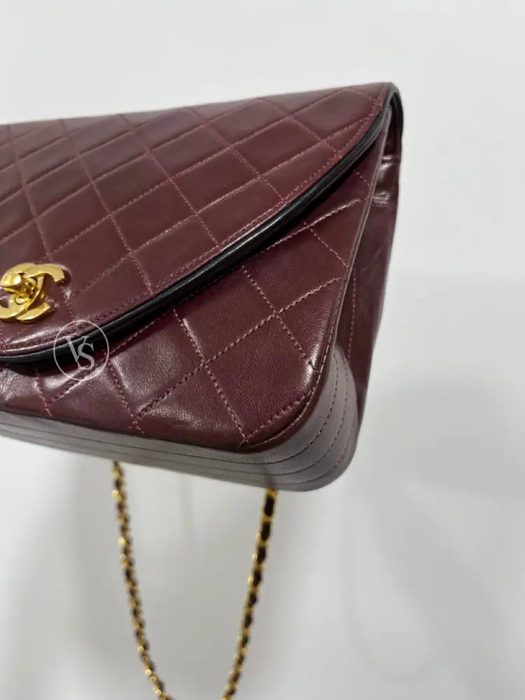 Chanel 80S Burgundy Plum Lambskin Quilted Curved Flap Shoulder And Crossbody Bag In 24K Ghw