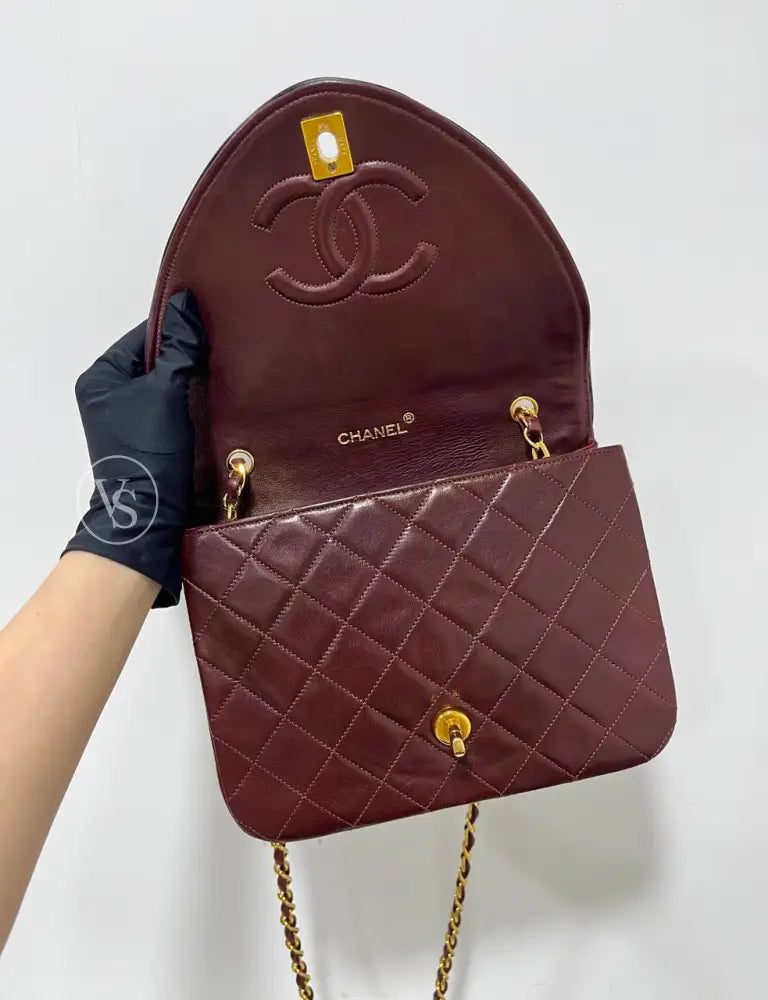 Chanel 80S Burgundy Plum Lambskin Quilted Curved Flap Shoulder And Crossbody Bag In 24K Ghw