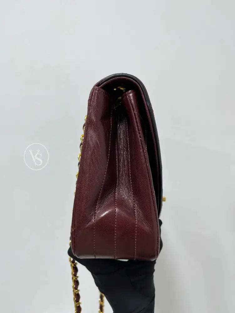 Chanel 80S Burgundy Plum Lambskin Quilted Curved Flap Shoulder And Crossbody Bag In 24K Ghw