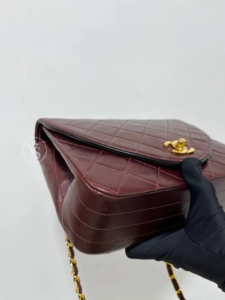 Chanel 80S Burgundy Plum Lambskin Quilted Curved Flap Shoulder And Crossbody Bag In 24K Ghw