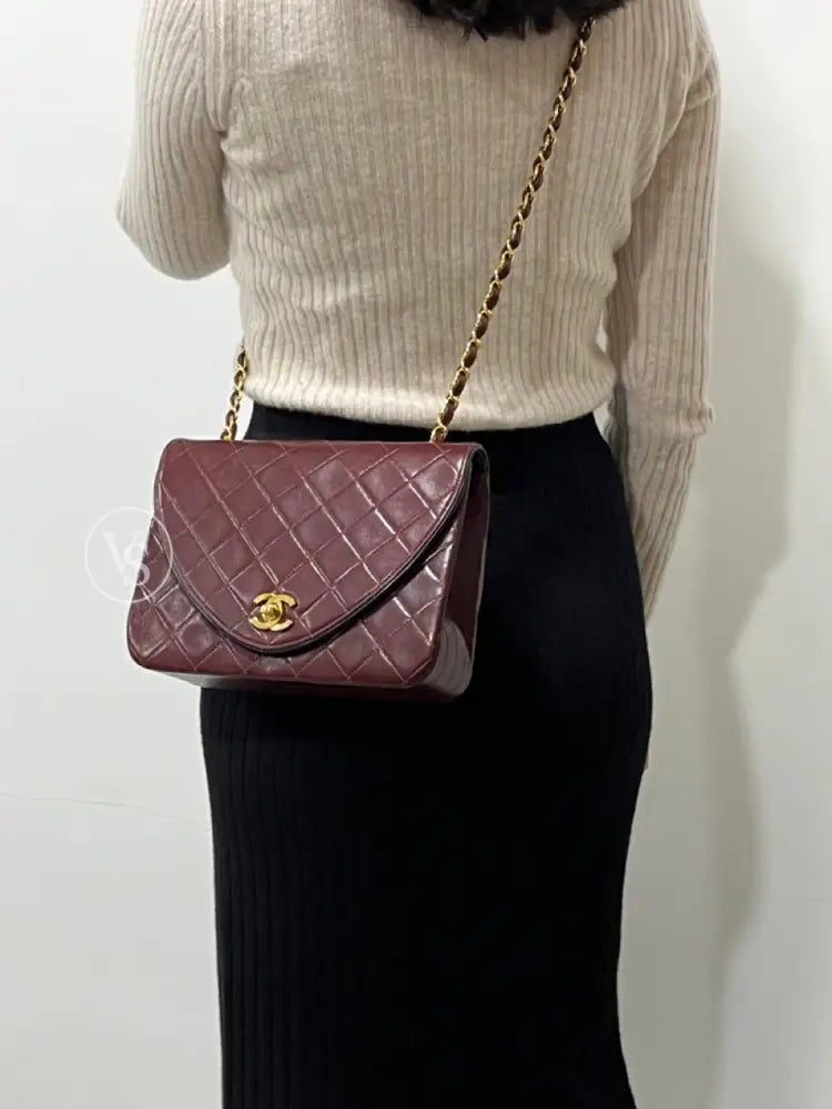 Chanel 80S Burgundy Plum Lambskin Quilted Curved Flap Shoulder And Crossbody Bag In 24K Ghw