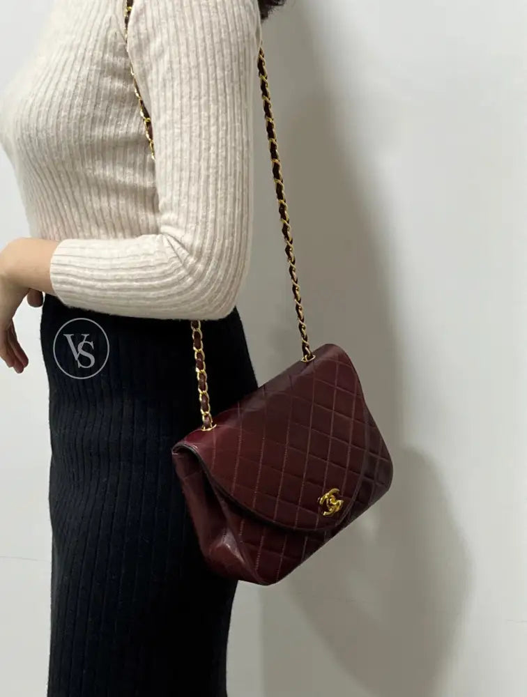 Chanel 80S Burgundy Plum Lambskin Quilted Curved Flap Shoulder And Crossbody Bag In 24K Ghw