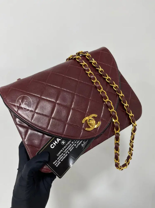 Chanel 80S Burgundy Plum Lambskin Quilted Curved Flap Shoulder And Crossbody Bag In 24K Ghw