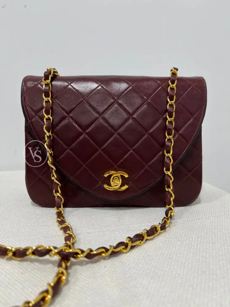 Chanel 80S Burgundy Plum Lambskin Quilted Curved Flap Shoulder And Crossbody Bag In 24K Ghw