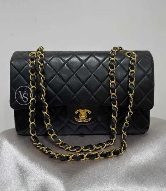 Vintage Chanel Black Lambskin quilted classic flap bag medium size in 24k gold plated hardwares 