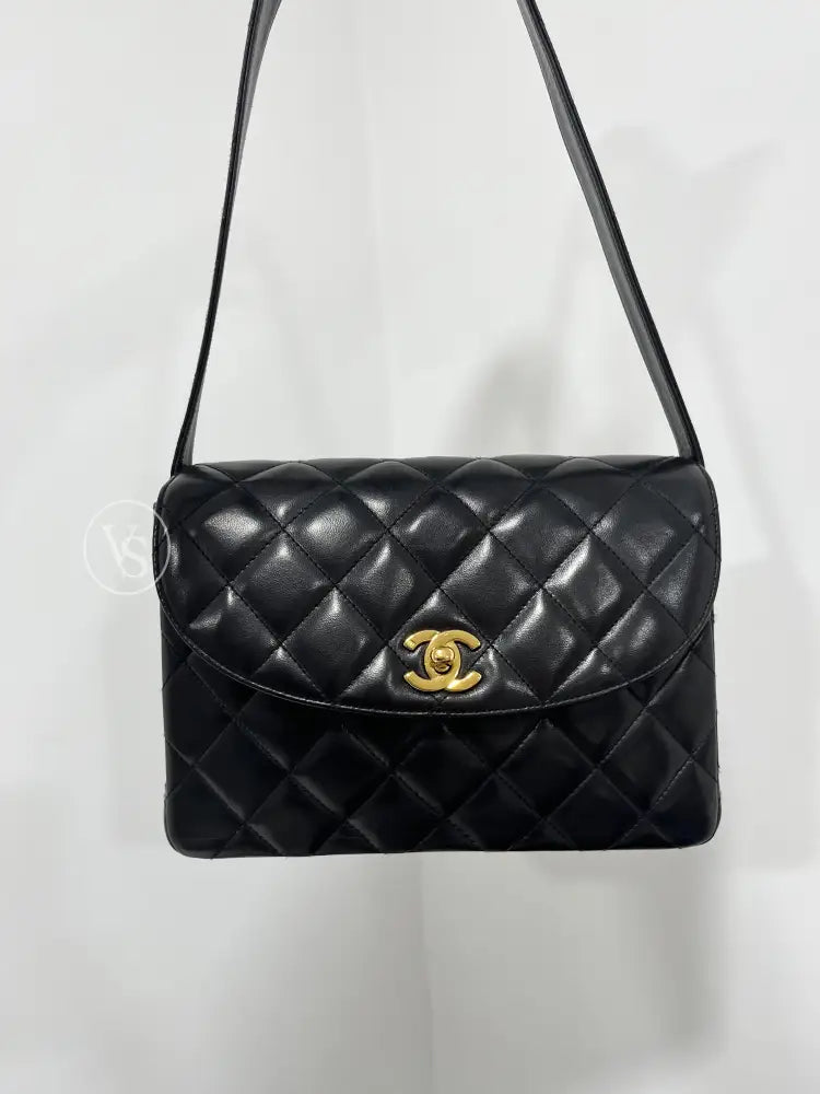 CHANEL Black Lambskin Quilted Curved Shoulder Flap Bag in 24k GHW Black