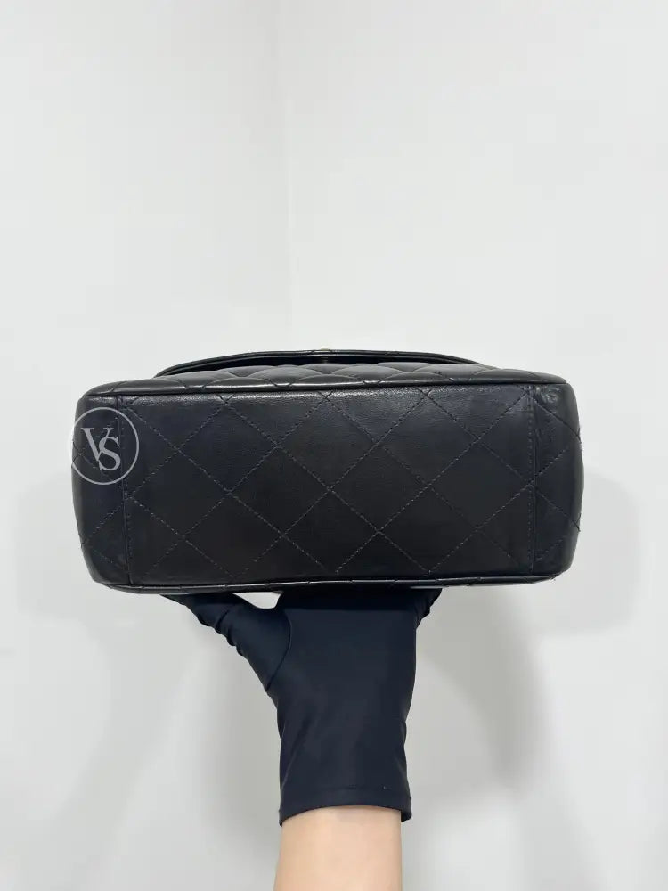 CHANEL Black Lambskin Quilted Curved Shoulder Flap Bag in 24k GHW Black