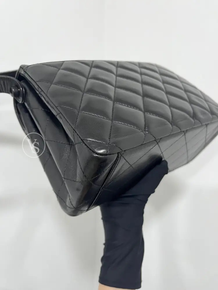 CHANEL Black Lambskin Quilted Curved Shoulder Flap Bag in 24k GHW Black