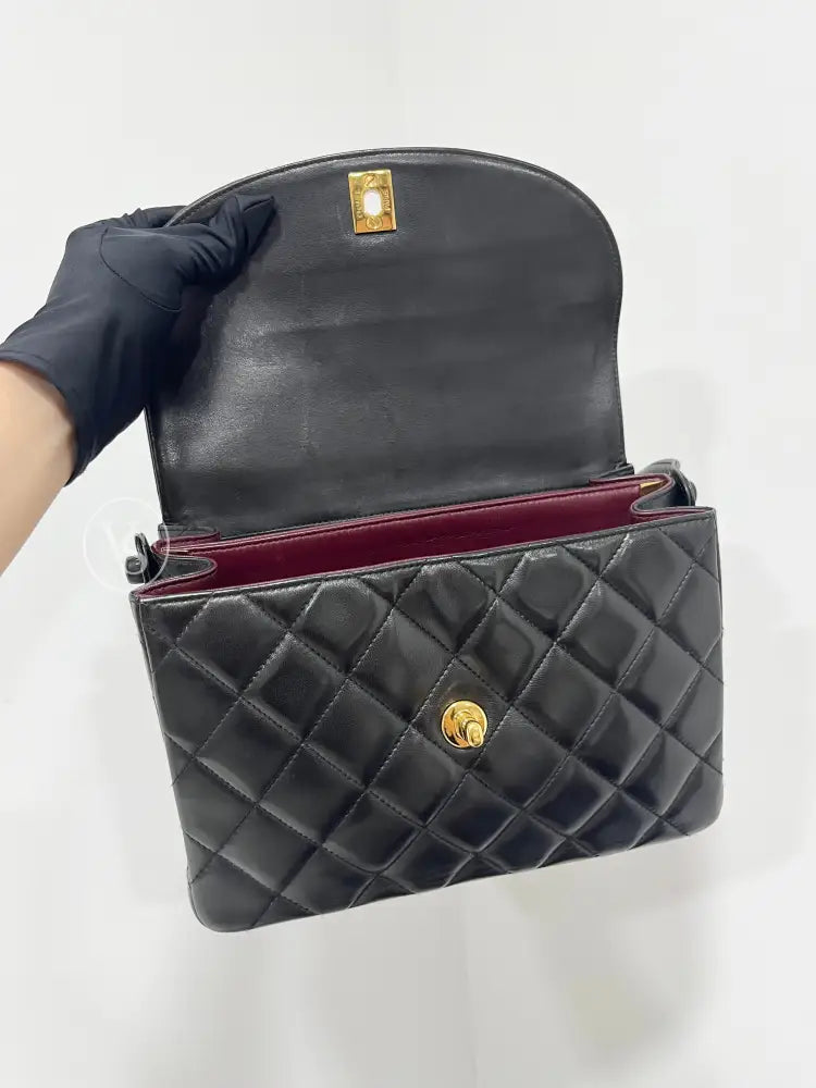 CHANEL Black Lambskin Quilted Curved Shoulder Flap Bag in 24k GHW Black