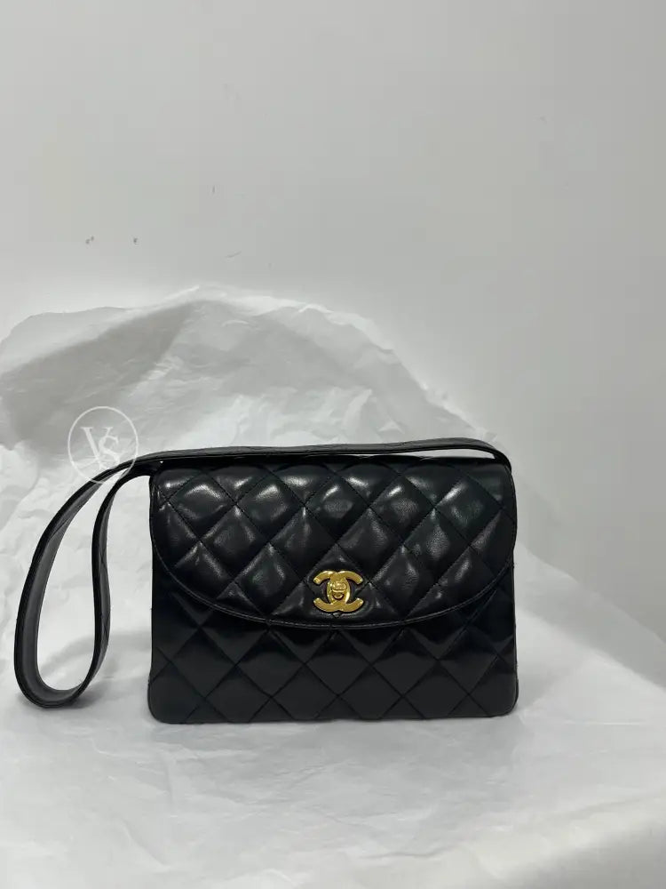 CHANEL Black Lambskin Quilted Curved Shoulder Flap Bag in 24k GHW Black