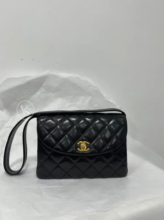 CHANEL Black Lambskin Quilted Curved Shoulder Flap Bag in 24k GHW Black