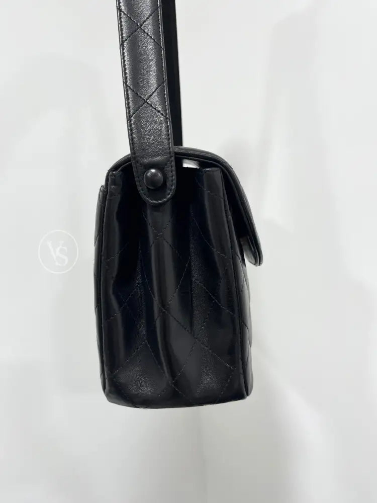 CHANEL Black Lambskin Quilted Curved Shoulder Flap Bag in 24k GHW Black