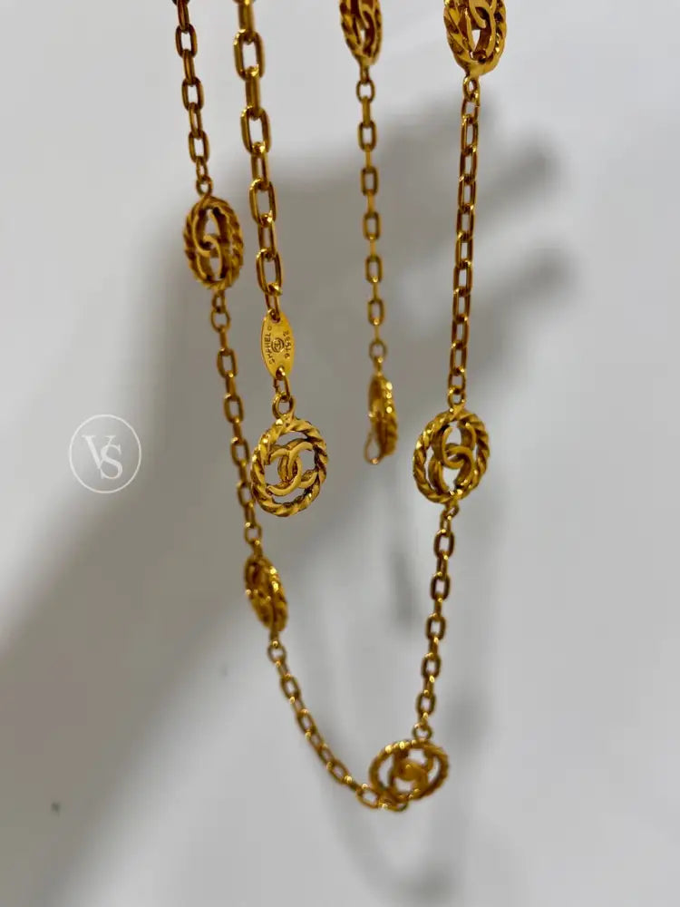 Chanel Gold Plated Long Chain Round Cut - Out Cc Belt/Necklace 1982